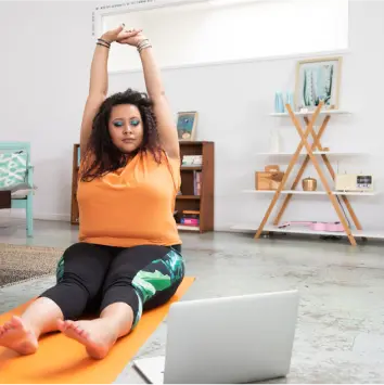 Woman doing yoga to relieve arthritis pain